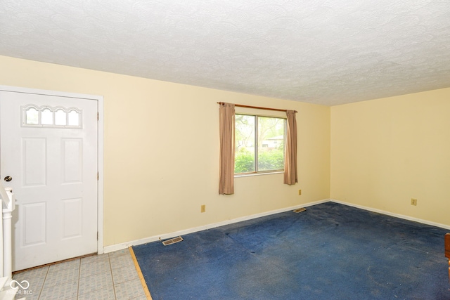 3325 Broadview Ct, Indianapolis, IN 46227 - entrance foyer with baseboards and a textured ceiling