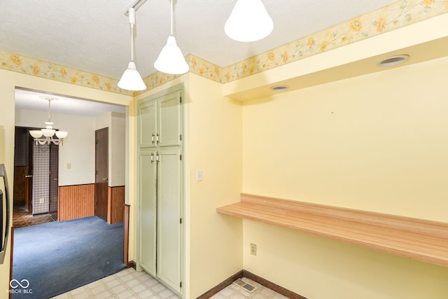 3325 Broadview Ct, Indianapolis, IN 46227 - mudroom with a wainscoted wall, a chandelier, and light floors
