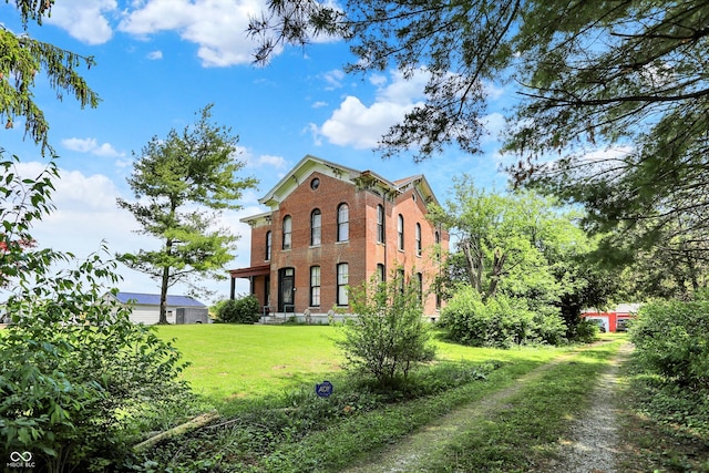 2490 S County Road 60 E, Greensburg, IN 47240 - view of side of home with brick siding and a yard
