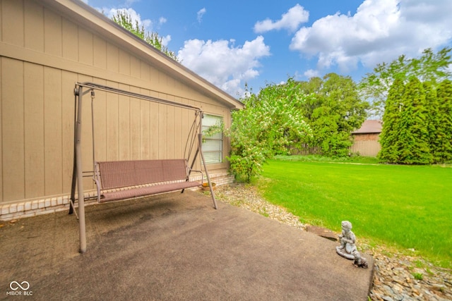 3537 Woodglen Way, Anderson, IN 46011 - view of grassy yard featuring a patio area