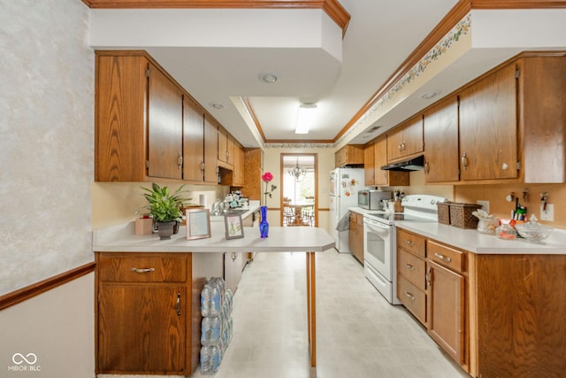 3537 Woodglen Way, Anderson, IN 46011 - kitchen with white appliances, under cabinet range hood, light countertops, brown cabinetry, and crown molding