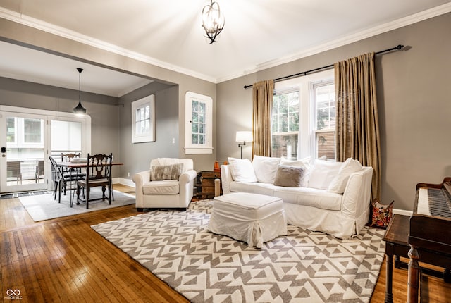 4130 N Meridian St, Indianapolis, IN 46208 - living area with healthy amount of natural light, hardwood / wood-style floors, baseboards, and ornamental molding