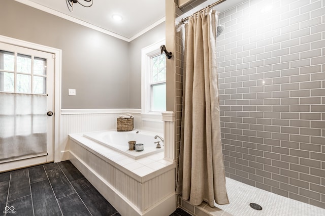 4130 N Meridian St, Indianapolis, IN 46208 - full bath with a tile shower, ornamental molding, a garden tub, wainscoting, and wood finished floors