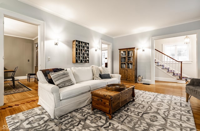 4130 N Meridian St, Indianapolis, IN 46208 - living area with ornamental molding, wood finished floors, stairway, and baseboards