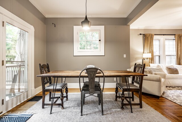 4130 N Meridian St, Indianapolis, IN 46208 - dining space featuring healthy amount of natural light, wood finished floors, crown molding, and baseboards