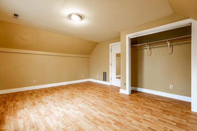 4130 N Meridian St, Indianapolis, IN 46208 - additional living space featuring wood finished floors, vaulted ceiling, and baseboards