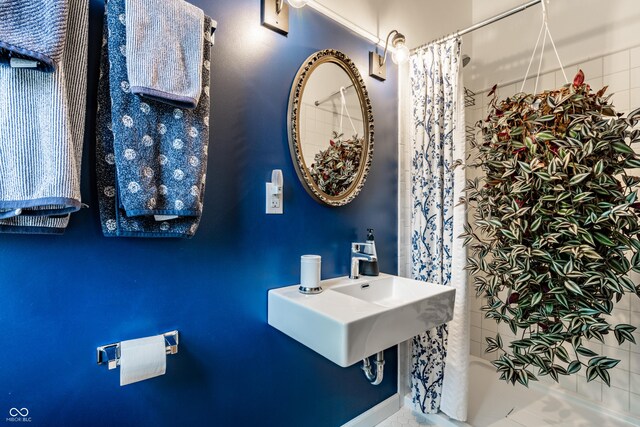 4130 N Meridian St, Indianapolis, IN 46208 - bathroom featuring a shower with shower curtain and a sink