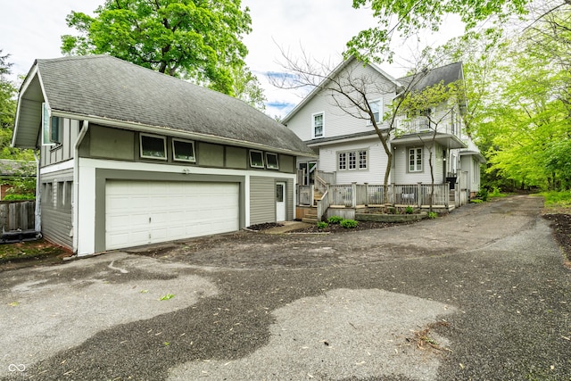 4130 N Meridian St, Indianapolis, IN 46208 - view of front of house with a wooden deck and roof with shingles