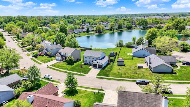 aerial perspective of suburban area featuring a large body of water