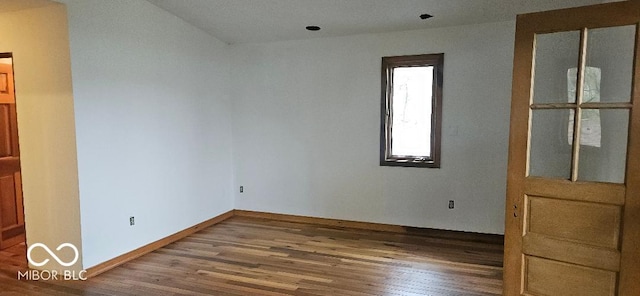 3854 Three Mile Rd, Centerville, IN 47330 - unfurnished room with wood finished floors and baseboards