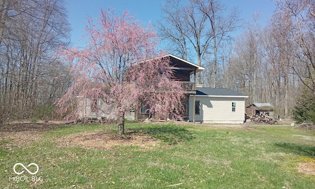 3854 Three Mile Rd, Centerville, IN 47330 - rear view of house with a yard
