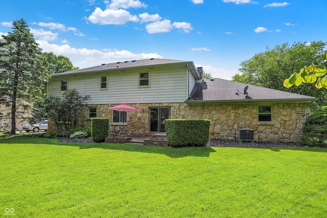 781 Dayton Dr, Carmel, IN 46033 - rear view of property featuring stone siding, cooling unit, and a yard