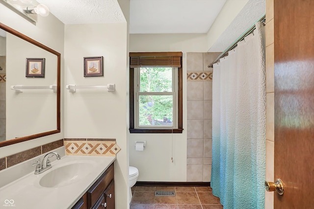 781 Dayton Dr, Carmel, IN 46033 - full bathroom featuring toilet, vanity, tile patterned flooring, and a shower with curtain