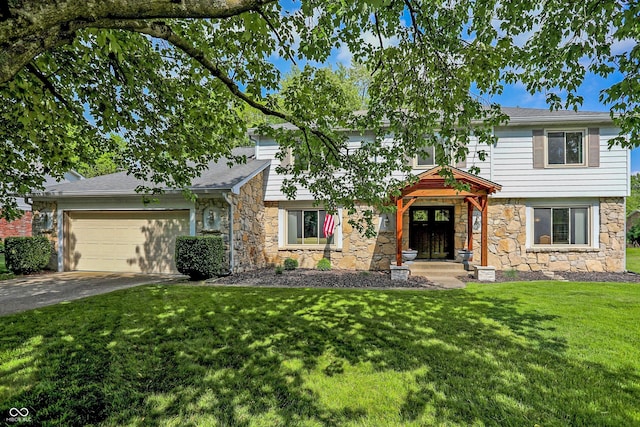 781 Dayton Dr, Carmel, IN 46033 - view of front of home featuring stone siding, a garage, driveway, a front yard, and french doors