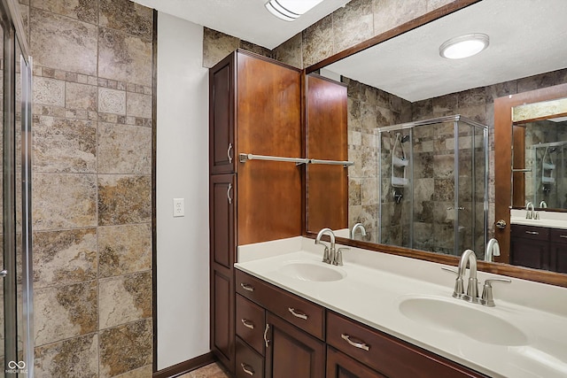 781 Dayton Dr, Carmel, IN 46033 - bathroom with a shower stall, double vanity, and baseboards