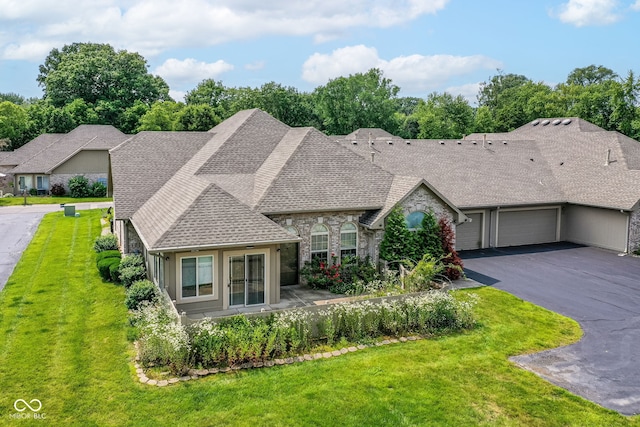7645 Briarstone Ln, Indianapolis, IN 46227 - view of front of home featuring a shingled roof, a front lawn, a garage, and driveway