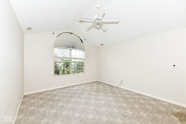 7645 Briarstone Ln, Indianapolis, IN 46227 - carpeted spare room with vaulted ceiling and ceiling fan