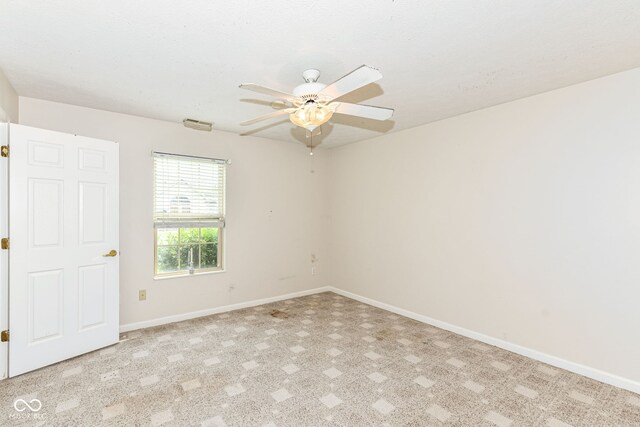 7645 Briarstone Ln, Indianapolis, IN 46227 - empty room featuring a ceiling fan and baseboards