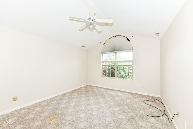 7645 Briarstone Ln, Indianapolis, IN 46227 - spare room featuring lofted ceiling, carpet floors, and a ceiling fan