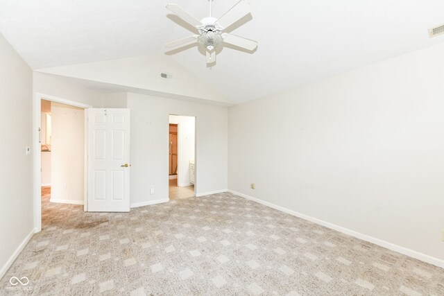 7645 Briarstone Ln, Indianapolis, IN 46227 - unfurnished bedroom featuring lofted ceiling, carpet, connected bathroom, and a ceiling fan