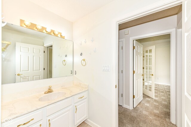 7645 Briarstone Ln, Indianapolis, IN 46227 - bathroom featuring vanity and baseboards