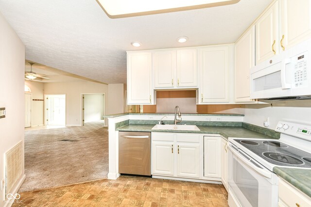 7645 Briarstone Ln, Indianapolis, IN 46227 - kitchen with white appliances, light carpet, open floor plan, white cabinetry, and ceiling fan