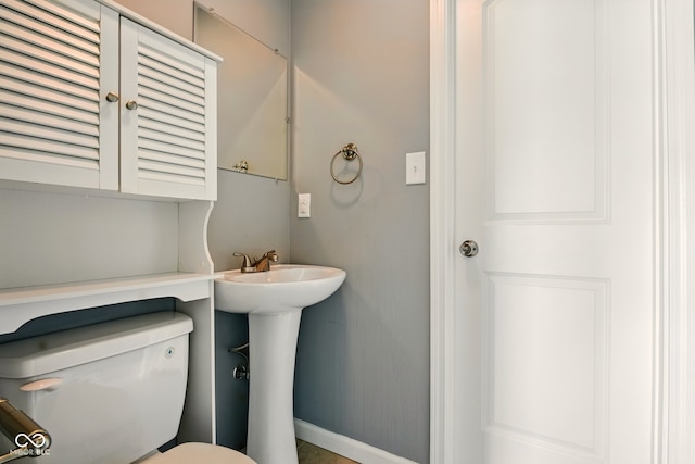 6462 Wings Ct, Brownsburg, IN 46112 - half bathroom featuring toilet and baseboards