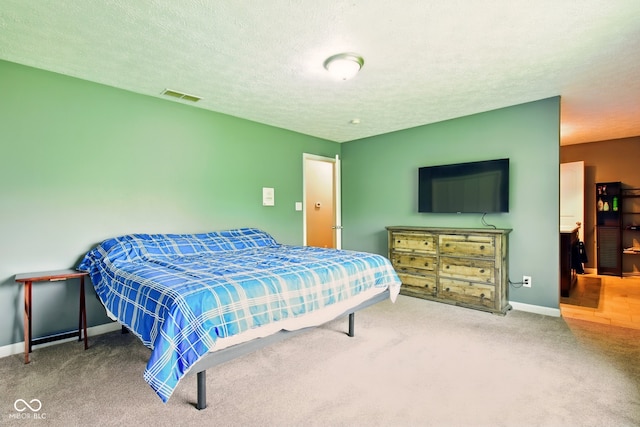 6462 Wings Ct, Brownsburg, IN 46112 - bedroom featuring carpet, a textured ceiling, and baseboards
