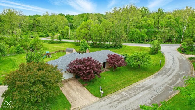 6462 Wings Ct, Brownsburg, IN 46112 - view from above of property with a heavily wooded area