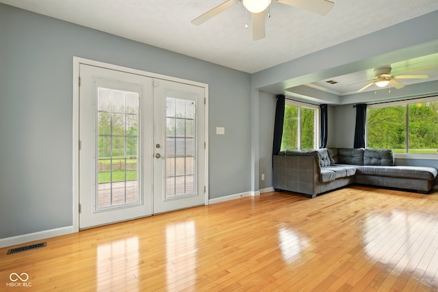 6462 Wings Ct, Brownsburg, IN 46112 - living area featuring a ceiling fan, french doors, and baseboards
