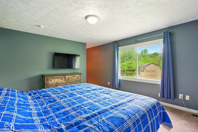 6462 Wings Ct, Brownsburg, IN 46112 - carpeted bedroom with baseboards and a textured ceiling