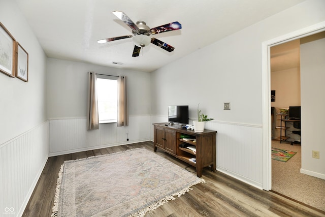 7604 Cloudy Ct, Camby, IN 46113 - bedroom with wainscoting, wood finished floors, a desk, and a ceiling fan
