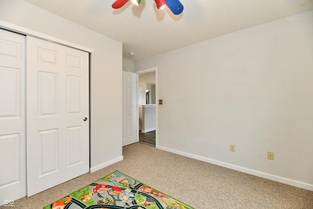 7604 Cloudy Ct, Camby, IN 46113 - game room with carpet flooring, baseboards, and a ceiling fan