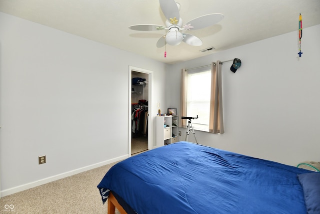 7604 Cloudy Ct, Camby, IN 46113 - bedroom featuring carpet flooring, baseboards, a spacious closet, a closet, and ceiling fan