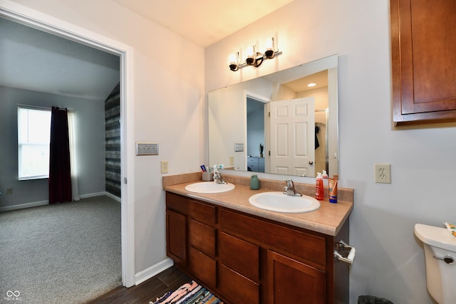 7604 Cloudy Ct, Camby, IN 46113 - bathroom with double vanity and baseboards