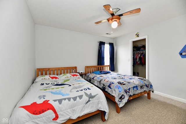7604 Cloudy Ct, Camby, IN 46113 - bedroom featuring carpet flooring, a walk in closet, ceiling fan, a closet, and baseboards