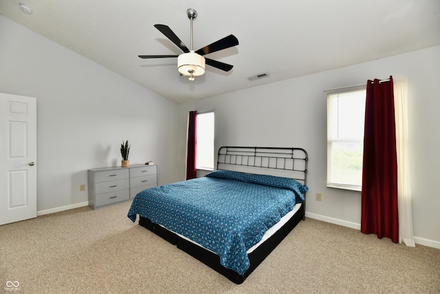 7604 Cloudy Ct, Camby, IN 46113 - carpeted bedroom featuring multiple windows, vaulted ceiling, baseboards, and a ceiling fan