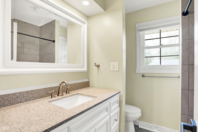 full bathroom featuring tile patterned flooring, toilet, and vanity