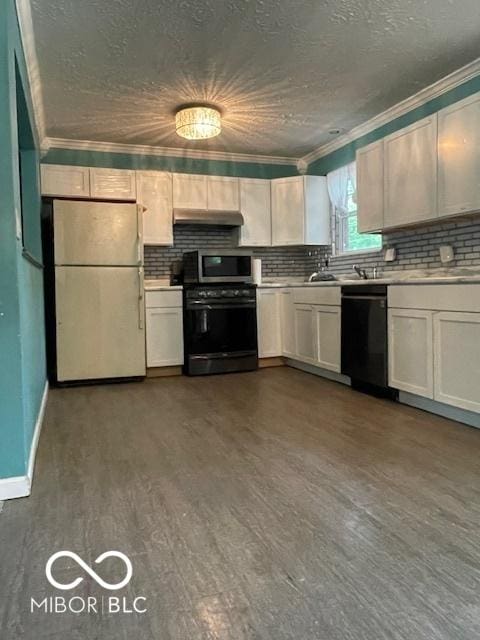 5802 Bertha St, Indianapolis, IN 46241 - kitchen with freestanding refrigerator, gas range oven, dishwasher, under cabinet range hood, and tasteful backsplash