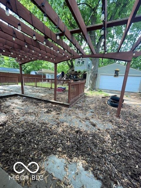 5802 Bertha St, Indianapolis, IN 46241 - view of yard with a pergola