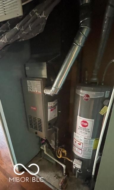 5802 Bertha St, Indianapolis, IN 46241 - utilities featuring water heater