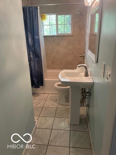 5802 Bertha St, Indianapolis, IN 46241 - full bathroom featuring shower / tub combo and toilet