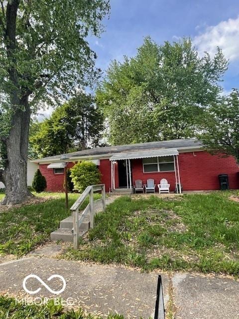5802 Bertha St, Indianapolis, IN 46241 - ranch-style house featuring brick siding and entry steps