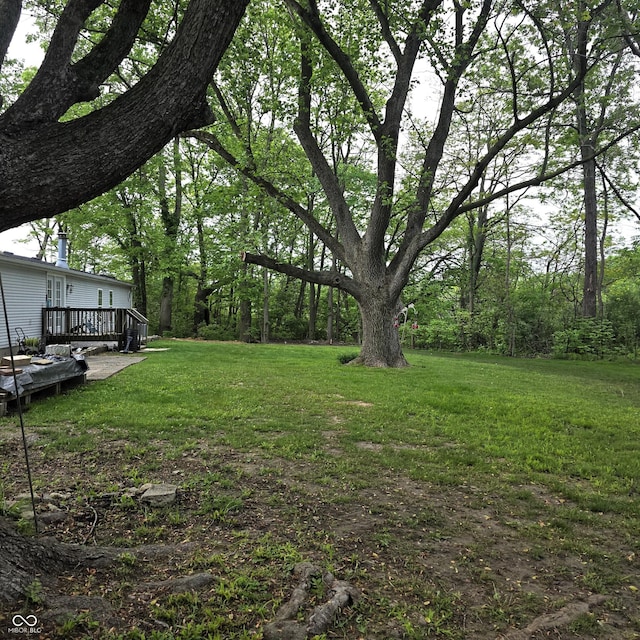 5269 W State Road 42, Brazil, IN 47834 - view of green lawn featuring a wooden deck