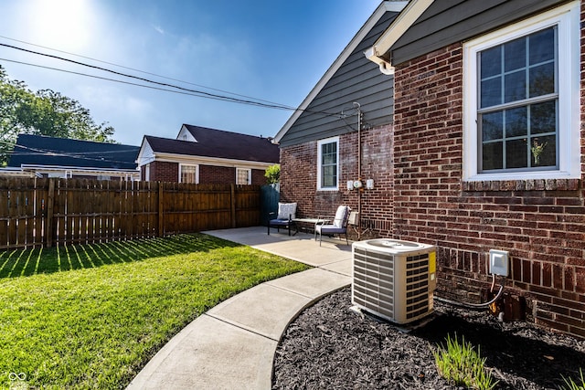 5428 E 10th St, Indianapolis, IN 46219 - view of yard featuring cooling unit and a patio