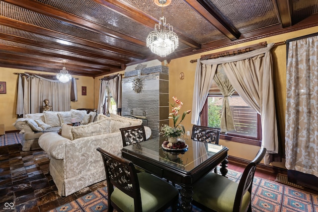 2134 N Alabama St, Indianapolis, IN 46202 - living room featuring beam ceiling, a chandelier, and baseboards