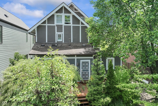 2134 N Alabama St, Indianapolis, IN 46202 - rear view of house featuring stucco siding and roof with shingles
