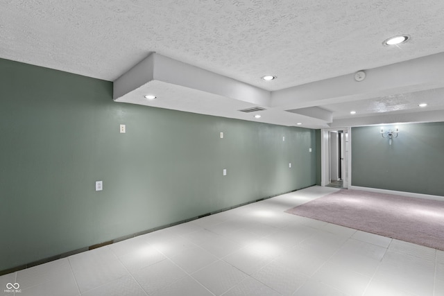 2134 N Alabama St, Indianapolis, IN 46202 - finished below grade area with recessed lighting, a textured ceiling, and baseboards