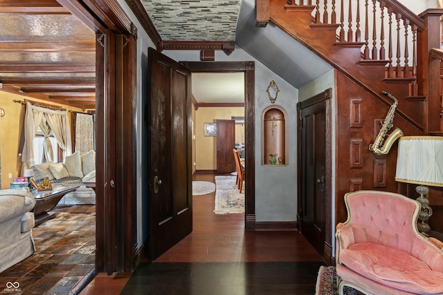 2134 N Alabama St, Indianapolis, IN 46202 - corridor featuring baseboards, stairs, ornamental molding, and dark wood-type flooring