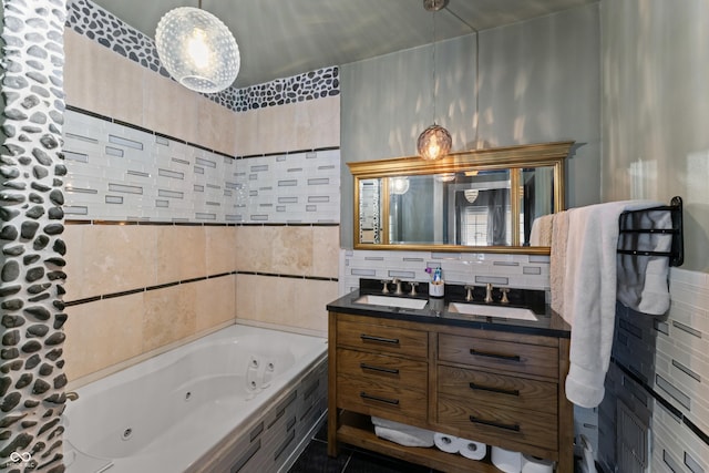 2134 N Alabama St, Indianapolis, IN 46202 - full bathroom featuring a whirlpool tub, double vanity, and tile walls